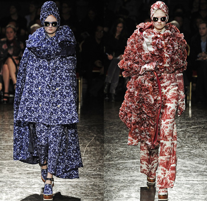 Undercover by Jun Takahashi 2014-2015 Fall Autumn Winter Womens Runway Show - Mode à Paris Fashion Week Catwalk - Cape Cloak Mantle Wrap Shawl Royalty Crowns Scottish Tartan Plaid Ruffles Fringes Outerwear Trench Coat Scarf Pierce Through Zippers Turtleneck Cardigan Dress Sash Motorcycle Biker Rider Leather Varsity Jacket Rounded Hem Ornamental Print Wide Leg Palazzo Pants Roll Up Fold Jacketdress