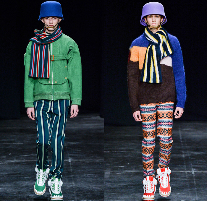 Walter Van Beirendonck 2014-2015 Fall Autumn Winter Mens Runway Looks Fashion - Paris Fashion Week Mode à Paris Masculine Défilés - Ski Leggings Tribal Ethnic Ornamental Parka Coat Rainwear Oversized Belt Strapped Suit Blazer Hypnotic Stripes Bucket Helmet Furry Knit Leather Bomber Jacket Turtleneck Scarf Androgyny Ruffles Embroidery Emblem