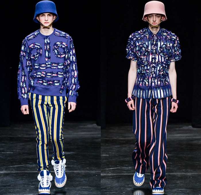 Walter Van Beirendonck 2014-2015 Fall Autumn Winter Mens Runway Looks Fashion - Paris Fashion Week Mode à Paris Masculine Défilés - Ski Leggings Tribal Ethnic Ornamental Parka Coat Rainwear Oversized Belt Strapped Suit Blazer Hypnotic Stripes Bucket Helmet Furry Knit Leather Bomber Jacket Turtleneck Scarf Androgyny Ruffles Embroidery Emblem