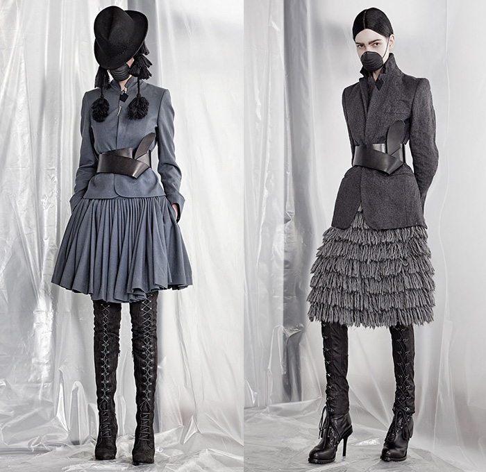 A.F. Vandevorst 2015-2016 Fall Autumn Winter Womens Lookbook Presentation - Mode à Paris Fashion Week Mode Féminin France - Apocalyptic Black Dark Lace Up Boots Chunky Knit Drapery Mask Wrap Dress Accordion Pleats Crow Hat Mask Boots Leather Headwear Rabbit Ears Fringes Hat Robe Scarf Shawl Cape Cloak Pants Trousers Furry Skirt Frock Bomber Jacket Rocker Leggings Flowers Florals Vest Waistcoat Frayed Raw Hem