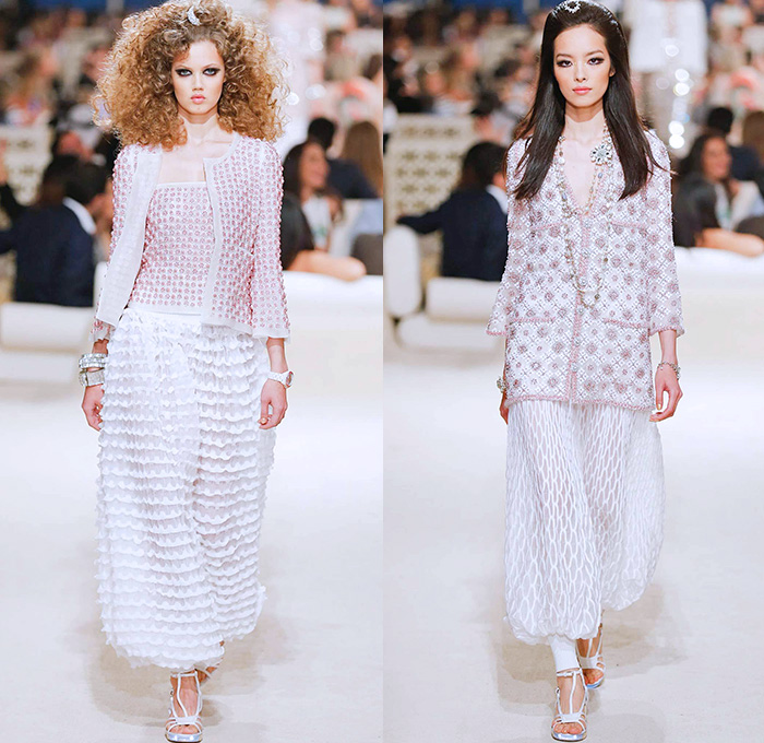 Chanel Womens Cruise 2015 Runway Collection - Dubai United Arab Emirates UAE Croisière Resort Pre Spring Fashion Show Catwalk Looks Style - Tweed 3D Flowers Embellishments Wide Leg Palazzo Harem Pants Outerwear Jacket Mesh Florals Embroidery Sequins Rhinestones Geometric Metallic Jeans Coated Flare Blouse Checks Jogging Sweatpants Rope Parka Lace Crochet Frizzy Hair Off Shoulder Knit Cardigan Drapery Moon Skirt Frock Maxi Dress Sheer Chiffon Frayed Gloves Cape Cloak Tunic Caftan Kaftan Leg Warmer Sandals