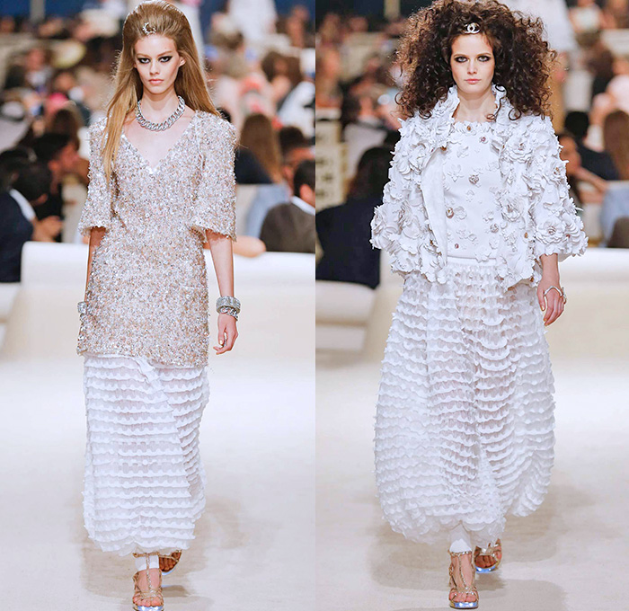 Chanel Womens Cruise 2015 Runway Collection - Dubai United Arab Emirates UAE Croisière Resort Pre Spring Fashion Show Catwalk Looks Style - Tweed 3D Flowers Embellishments Wide Leg Palazzo Harem Pants Outerwear Jacket Mesh Florals Embroidery Sequins Rhinestones Geometric Metallic Jeans Coated Flare Blouse Checks Jogging Sweatpants Rope Parka Lace Crochet Frizzy Hair Off Shoulder Knit Cardigan Drapery Moon Skirt Frock Maxi Dress Sheer Chiffon Frayed Gloves Cape Cloak Tunic Caftan Kaftan Leg Warmer Sandals