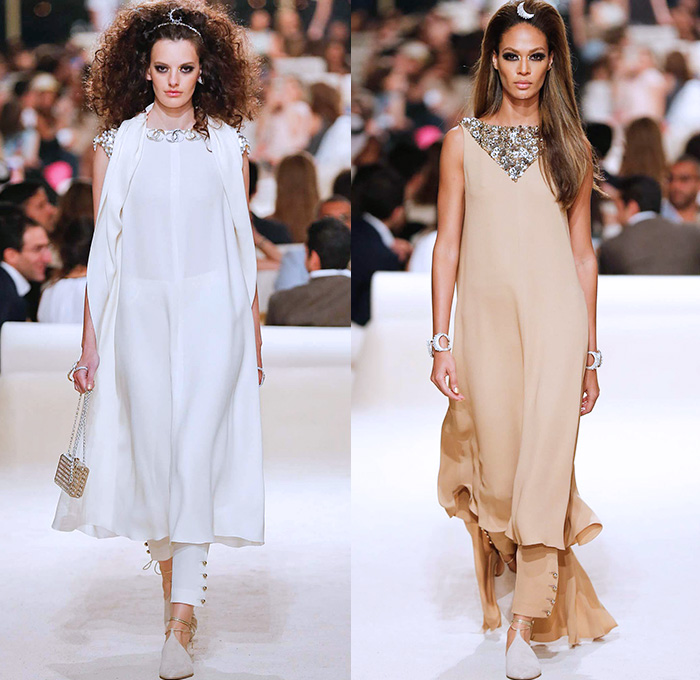 Chanel Womens Cruise 2015 Runway Collection - Dubai United Arab Emirates UAE Croisière Resort Pre Spring Fashion Show Catwalk Looks Style - Tweed 3D Flowers Embellishments Wide Leg Palazzo Harem Pants Outerwear Jacket Mesh Florals Embroidery Sequins Rhinestones Geometric Metallic Jeans Coated Flare Blouse Checks Jogging Sweatpants Rope Parka Lace Crochet Frizzy Hair Off Shoulder Knit Cardigan Drapery Moon Skirt Frock Maxi Dress Sheer Chiffon Frayed Gloves Cape Cloak Tunic Caftan Kaftan Leg Warmer Sandals