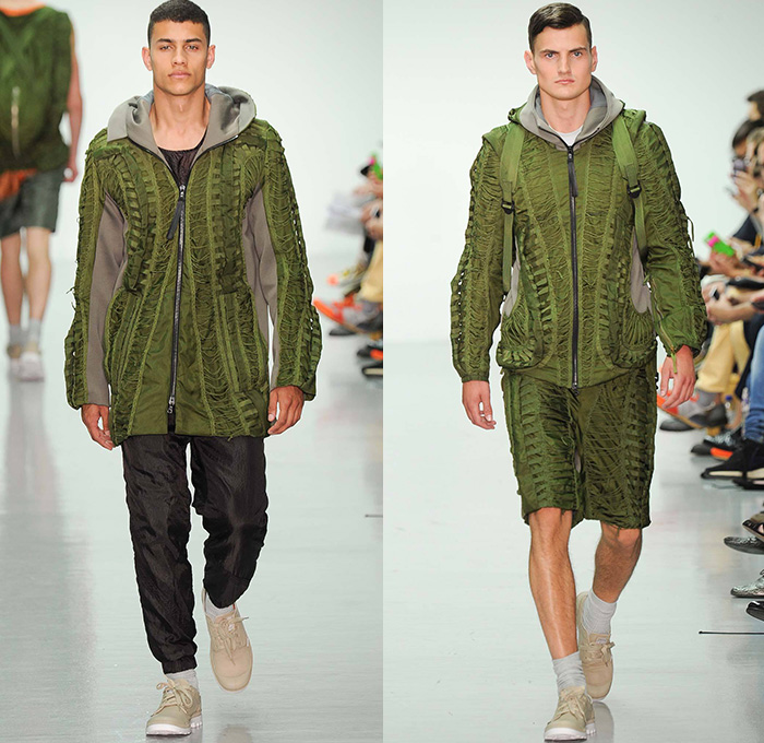 Christopher Raeburn 2015 Spring Summer Mens Runway Looks - London Collections British Fashion Council UK United Kingdom - Meridian Desert Boneyards Aviator Aircraft Military Airplanes Helicopters Missiles Motif Graphic Print Utility Perforated Mesh Parachute Bomber Jacket Outerwear Hoodie Backpack Anorak Parka Knee Panel Jogging Sweatpants Playing Cards Geometric Sweater Jumper Flowers Florals Fauna Leaves Foliage Nylon Lightweight Translucent Blazer Shorts