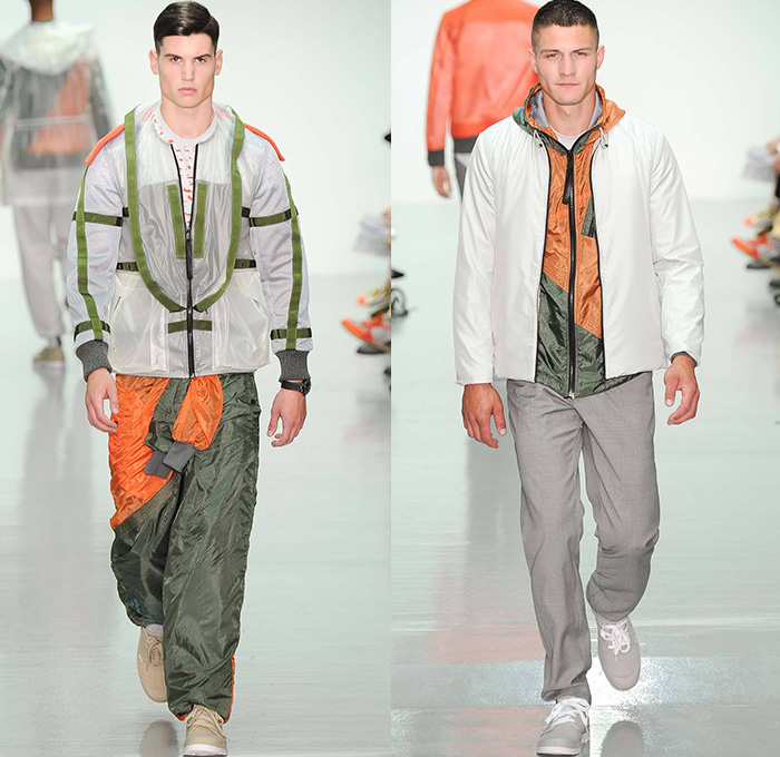 Christopher Raeburn 2015 Spring Summer Mens Runway Looks - London Collections British Fashion Council UK United Kingdom - Meridian Desert Boneyards Aviator Aircraft Military Airplanes Helicopters Missiles Motif Graphic Print Utility Perforated Mesh Parachute Bomber Jacket Outerwear Hoodie Backpack Anorak Parka Knee Panel Jogging Sweatpants Playing Cards Geometric Sweater Jumper Flowers Florals Fauna Leaves Foliage Nylon Lightweight Translucent Blazer Shorts