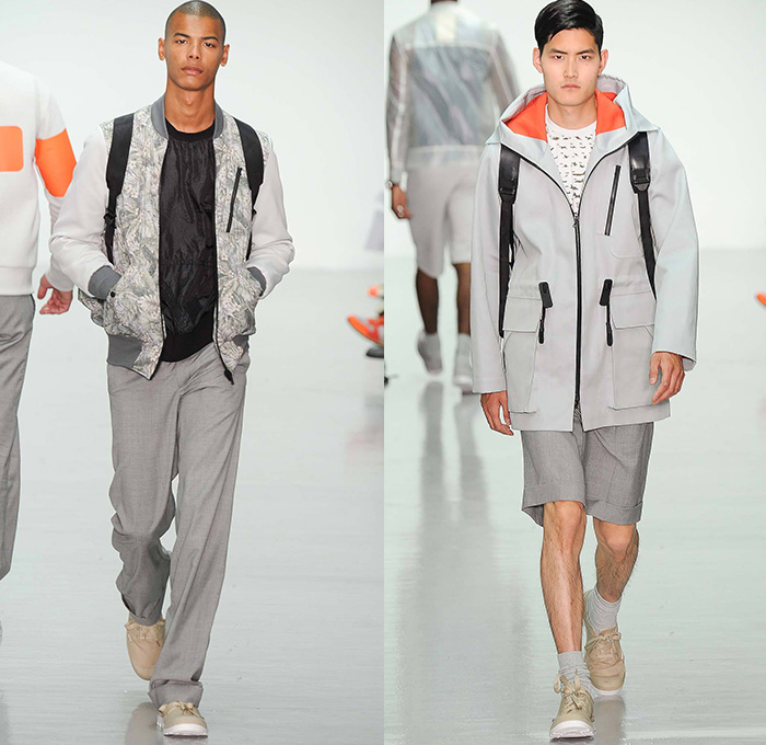 Christopher Raeburn 2015 Spring Summer Mens Runway Looks - London Collections British Fashion Council UK United Kingdom - Meridian Desert Boneyards Aviator Aircraft Military Airplanes Helicopters Missiles Motif Graphic Print Utility Perforated Mesh Parachute Bomber Jacket Outerwear Hoodie Backpack Anorak Parka Knee Panel Jogging Sweatpants Playing Cards Geometric Sweater Jumper Flowers Florals Fauna Leaves Foliage Nylon Lightweight Translucent Blazer Shorts