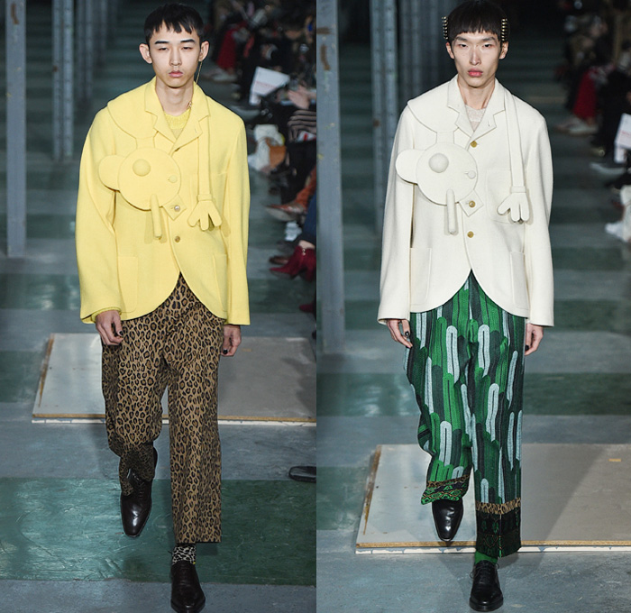 Walter Van Beirendonck 2016-2017 Fall Autumn Winter Mens Runway Catwalk Looks - Mode à Paris Fashion Week Mode Masculine France - Woest Plastic Denim Jeans Leopard Androgyny Knit Sweater Hand Legs Feet Face Oversized Outerwear Coat Wide Leg Trousers Decorative Art Polka Dots Silk Suit Bomber Jacket Embellishments Embroidery Jumpsuit Coveralls Boiler Suit Planes Leather Leggings Geometric Tribal Mask Ruffles Drapery