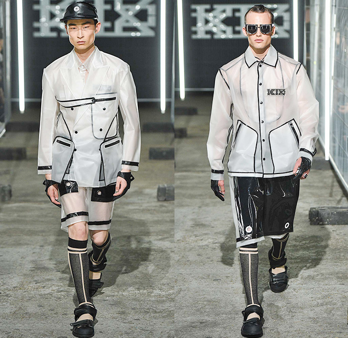 KTZ by Marjan Pejoski 2016 Spring Summer Mens Runway Catwalk Looks - London Collections: Men British Fashion Council UK United Kingdom - Brown Paper Newsprint Motocross MX Biker Leather Rubber Aluminum Electrical Tape Panels PVC Plastic Street Parachute Poncho Cape Cloak Coat Bomber Jacket Shorts Socks Sandals Gloves Helmet Metallic Zipper Cargo Pockets Tool Box Waistcoat Barcode Frayed Raw Hem Crinkles Mesh