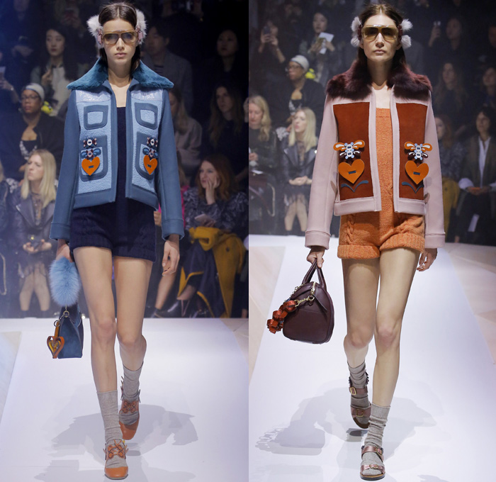 Anya Hindmarch 2017-2018 Fall Autumn Winter Womens Runway Catwalk Looks - London Fashion Week Collections UK United Kingdom - Old Norse Folklore Scandinavian Kurbits Wool Felt Outerwear Coat Poncho Cloak Cape Jacket Turtleneck Chunky Fairisle Knit Sweater Embellishments Adorned Decorated Bedazzled Hearts Dragonflies Leaves Combishorts Romper Onesie Playsuit Stack Collection Handmade Paper Chains Leather Straps Bag Mountain Smiley Slides Shearling Creepers Eyes Clogs Mules Sandals With Socks Sunglasses Shades Ear Muffs Hotpants Diaper Shorts Tote