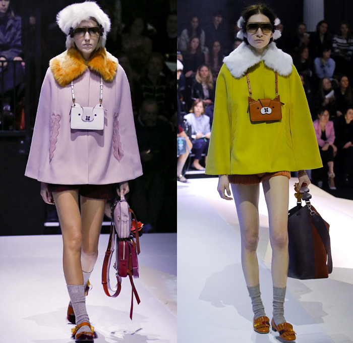 Anya Hindmarch 2017-2018 Fall Autumn Winter Womens Runway Catwalk Looks - London Fashion Week Collections UK United Kingdom - Old Norse Folklore Scandinavian Kurbits Wool Felt Outerwear Coat Poncho Cloak Cape Jacket Turtleneck Chunky Fairisle Knit Sweater Embellishments Adorned Decorated Bedazzled Hearts Dragonflies Leaves Combishorts Romper Onesie Playsuit Stack Collection Handmade Paper Chains Leather Straps Bag Mountain Smiley Slides Shearling Creepers Eyes Clogs Mules Sandals With Socks Sunglasses Shades Ear Muffs Hotpants Diaper Shorts Tote