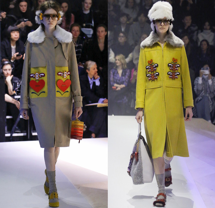 Anya Hindmarch 2017-2018 Fall Autumn Winter Womens Runway Catwalk Looks - London Fashion Week Collections UK United Kingdom - Old Norse Folklore Scandinavian Kurbits Wool Felt Outerwear Coat Poncho Cloak Cape Jacket Turtleneck Chunky Fairisle Knit Sweater Embellishments Adorned Decorated Bedazzled Hearts Dragonflies Leaves Combishorts Romper Onesie Playsuit Stack Collection Handmade Paper Chains Leather Straps Bag Mountain Smiley Slides Shearling Creepers Eyes Clogs Mules Sandals With Socks Sunglasses Shades Ear Muffs Hotpants Diaper Shorts Tote