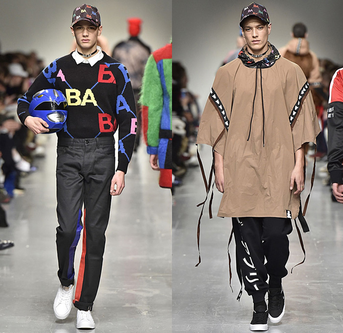 Bobby Abley 2017-2018 Fall Autumn Winter Mens Runway Catwalk Looks - London Collections Fashion Week Mens British Fashion Council UK United Kingdom - Power Rangers Dinosaurs Teddy Bear Pop Art Knit Sweater Jumper Furry Shaggy Shearling Mohair Shorts Over Leggings Straps Arm Warmers Sweatpants Jogger Colorblock Tracksuit Outerwear Coat Crop Top Midriff Leg Panels Poncho Cloak Trucker Jacket Harness Trainers Shoes Choker Helmet Tote Bag Denim Jeans
