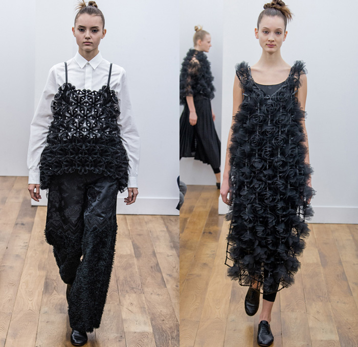 Noir Kei Ninomiya 2017-2018 Fall Autumn Winter Womens Runway Catwalk Looks - Mode à Paris Fashion Week Mode Féminin France - Scarlet Red Modular Chain Link Ring Rivet Belts Straps Mesh Lattice Plush Fur Dimensional Structural Organic Shape Sculptural Floral Flower Bud Trompe L'oeil Ruffles Zigzag Sheer Chiffon Velvet Jacquard Quilted Waffle Long Sleeve Blouse Silk Satin Accordion Pleats Skirt Frock Leggings Hanging Sleeve Oversized Outerwear Coat Bell Shape Ribbons Bomber Jacket Pinafore Dress Embroidery Decorated Bedazzled Vest Waistcoat Shawl Beetle Wings Rocket Wingsuit