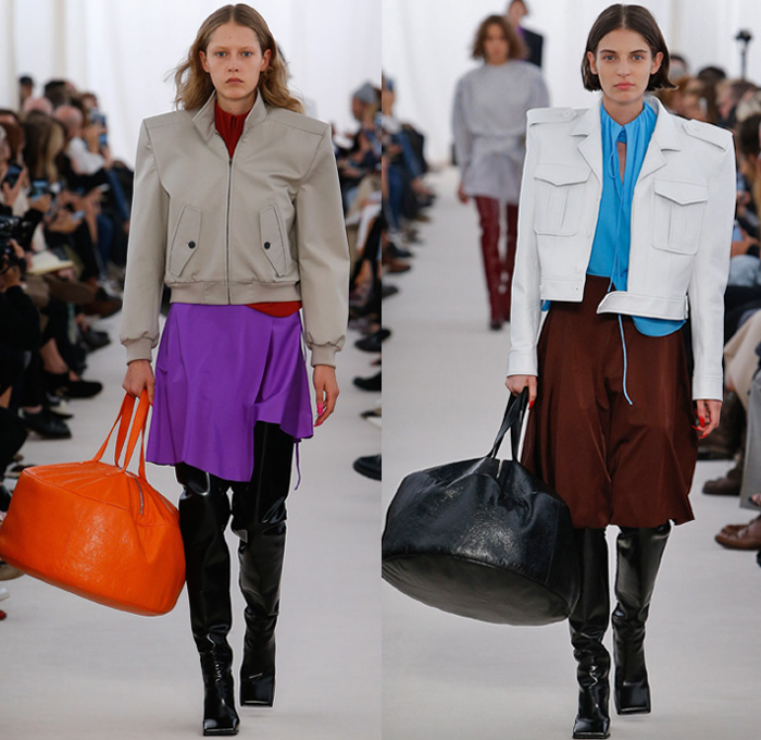 Balenciaga 2017 Spring Summer Womens Runway Catwalk Looks - Mode à Paris Fashion Week Mode Féminin France - Frankenstein Football Shoulders Shoulder Pads Whalebone Rod Oversized Outerwear Trench Coat Overcoat Tuxedo Jacket Blazer Rainwear Parka Cape Cloak Latex Quilted Waffle Puffer Down Vest Gilet Spandex Stretch Leggings Curtain Neck Silk Satin Drapery Maxi Dress Solid Color Asymmetrical Hem Blouse Wrap Stripes Pussycat Bow Stars Dots Flowers Floral Leaves Foliage Print Shirtdress Mesh Lace Knit Tie Up Hood Wrapped Boots Comforter Tote Bag Brooch Gloves Chain