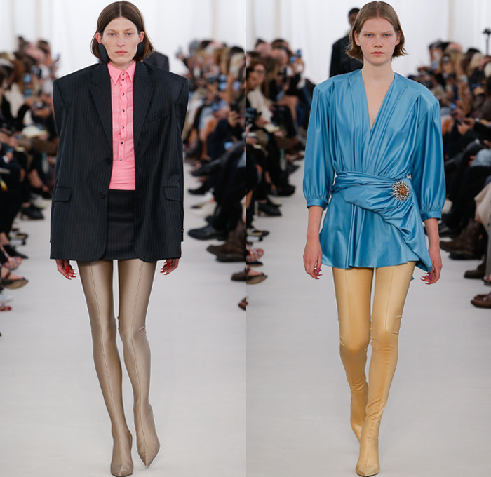 Balenciaga 2017 Spring Summer Womens Runway Catwalk Looks - Mode à Paris Fashion Week Mode Féminin France - Frankenstein Football Shoulders Shoulder Pads Whalebone Rod Oversized Outerwear Trench Coat Overcoat Tuxedo Jacket Blazer Rainwear Parka Cape Cloak Latex Quilted Waffle Puffer Down Vest Gilet Spandex Stretch Leggings Curtain Neck Silk Satin Drapery Maxi Dress Solid Color Asymmetrical Hem Blouse Wrap Stripes Pussycat Bow Stars Dots Flowers Floral Leaves Foliage Print Shirtdress Mesh Lace Knit Tie Up Hood Wrapped Boots Comforter Tote Bag Brooch Gloves Chain