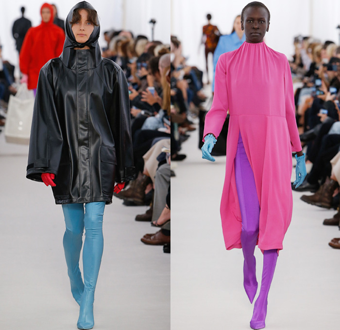 Balenciaga 2017 Spring Summer Womens Runway Catwalk Looks - Mode à Paris Fashion Week Mode Féminin France - Frankenstein Football Shoulders Shoulder Pads Whalebone Rod Oversized Outerwear Trench Coat Overcoat Tuxedo Jacket Blazer Rainwear Parka Cape Cloak Latex Quilted Waffle Puffer Down Vest Gilet Spandex Stretch Leggings Curtain Neck Silk Satin Drapery Maxi Dress Solid Color Asymmetrical Hem Blouse Wrap Stripes Pussycat Bow Stars Dots Flowers Floral Leaves Foliage Print Shirtdress Mesh Lace Knit Tie Up Hood Wrapped Boots Comforter Tote Bag Brooch Gloves Chain