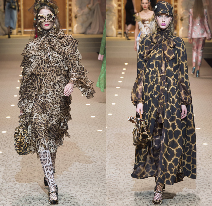 Dolce + Gabbana 2018-2019 Fall Autumn Winter Womens Runway Looks - Milan Fashion Week Italy - Leopard Zebra Embroidery Sequins Jewels Trinkets Ruffles Patches Pop Art Cherubs Religious Cross Feathers Cow Brocade Velvet Fringes Flowers Tulle Veil Brooch Lace Up Corset Tassels Houndstooth Tweed Hearts Pinstripe Fur Coat Pantsuit Robe Strapless Knit Cardigan Pussycat Bow Street Denim Jeans Tiered Stockings Jogger Wide Leg Dress Bag Chain Heels Tiara Beret Box Thurible Dinnerware Teddy Bear Boots