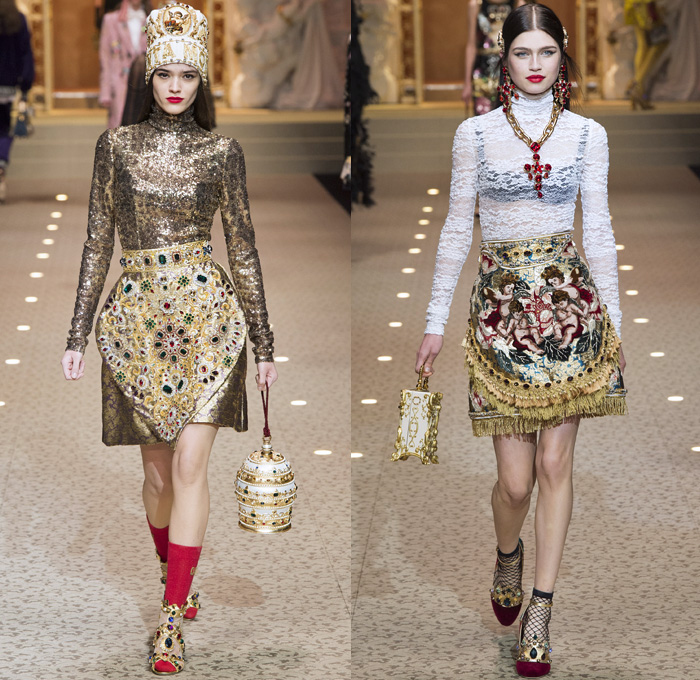 Dolce + Gabbana 2018-2019 Fall Autumn Winter Womens Runway Looks - Milan Fashion Week Italy - Leopard Zebra Embroidery Sequins Jewels Trinkets Ruffles Patches Pop Art Cherubs Religious Cross Feathers Cow Brocade Velvet Fringes Flowers Tulle Veil Brooch Lace Up Corset Tassels Houndstooth Tweed Hearts Pinstripe Fur Coat Pantsuit Robe Strapless Knit Cardigan Pussycat Bow Street Denim Jeans Tiered Stockings Jogger Wide Leg Dress Bag Chain Heels Tiara Beret Box Thurible Dinnerware Teddy Bear Boots