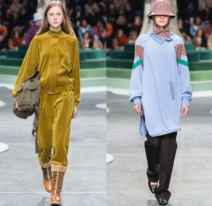 Lacoste 2018-2019 Fall Autumn Winter Womens Runway Catwalk Looks - Mode à Paris Fashion Week France - Retro 1980s Eighties 1990s Nineties Sportswear Plaid Tartan Check Argyle Houndstooth Corduroy Velvet Fur Shearling Suede Fauna Leaves Foliage Animals Birds Monkeys Turtles Tiger Fleece Parka Poncho Cape Anorak Cagoule Leather Hoodie Drawstring Sweater Track Jacket Shirtdress Sweaterdress Denim Jeans Sweatshirt Jogger Sweatpants Capri Culottes Skirt Bucket Hat Boots Galoshes Messenger Bag