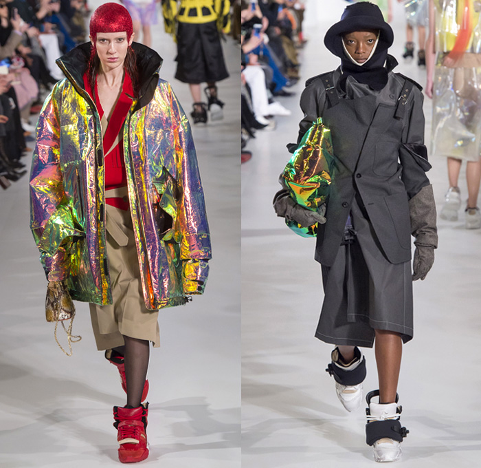 Maison Margiela 2018-2019 Fall Autumn Winter Womens Runway Catwalk Looks - Mode à Paris Fashion Week France - Post-Apocalyptic Techno Hi-Tech Fabrics Reflective Metallic Foil Layers Hazard Rainwear Plastic Hoodie Sheer Chiffon Mesh Fishnet Fringes Feathers Straps Hybrid Combo Plaid Check Wireframe Lace Ruffles Outerwear Coat Parka Jacket Knit Sweater Turtleneck Jumpsuit Coveralls Accordion Pleats Dress Skirt Stockings Handbag Quilted Tote Headwear Cap Gas Bee Mask  Snowboard Trainers Boots