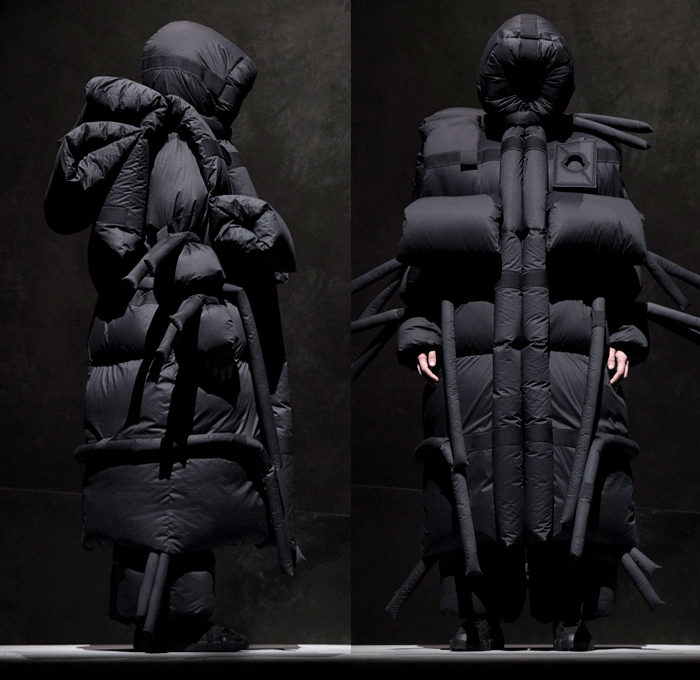 Moncler 5 Craig Green 2018-2019 Fall Autumn Winter Lookbook Presentation - Milano Moda Donna Collezione Milan Fashion Week Italy - Moncler Genius Project Arctic Alpine Black White Oversized Quilted Waffle Puffer Puffa Down Jacket Bubble Padded Parka Outerwear Coat Hoodie Cinch Straps Mountaineering Exoskeleton Beetle Pillow Comforter Antennae Samurai Warrior Tubes Stripes Ridges Inflatable Lifesaver Floatation Dimensional Sculptural Futuristic