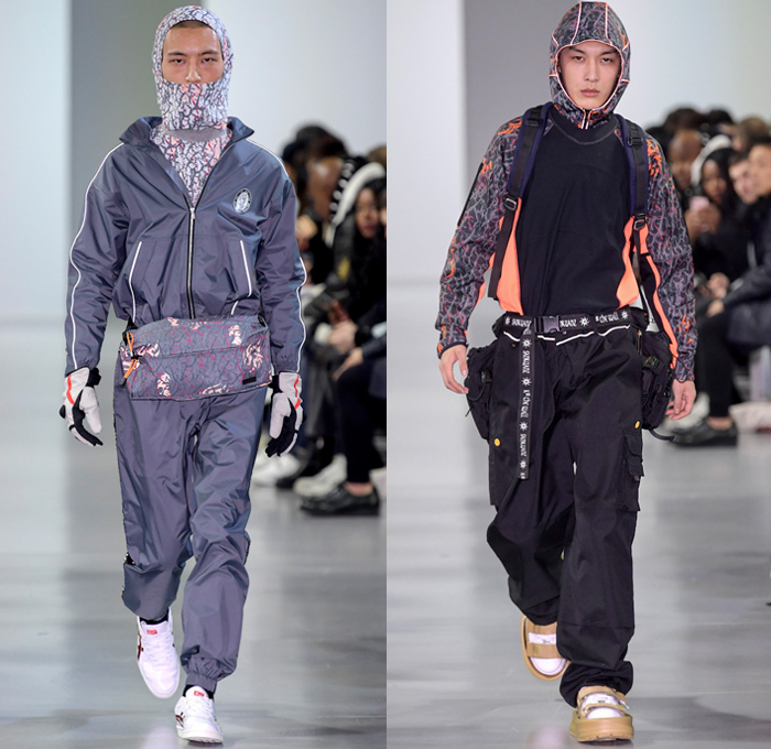 Sankuanz 2018-2019 Fall Autumn Winter Mens Runway Show Catwalk Looks - Mode à Paris Fashion Week Mode Masculine France - Post-Apocalyptic Survivalism Kill The Wall Utilitarian Technical Fabrics Reflective Panels Dystopian Streetwear Urban Vines Nylon Cargo Pockets PVC Vinyl Plaid Check Wrinkles Creases Metallic Foil Coat Parka Field Jacket Quilted Waffle Anorak Sweater Gloves Backpack Fanny Pack Waist Pouch Belt Bag Baseball Cap Sack Tote Mask Scarf Boots Strapped On Sandals