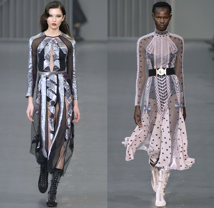 Temperley London 2018-2019 Fall Autumn Winter Womens Runway Catwalk Looks - London Fashion Week Collections UK - Trail Blazers 1940s Forties Aviator Pilot Military Badges Patches Khaki Fatigues Sheer Chiffon Tulle Geometric Ribbon Embroidery Bedazzled Sequins Clouds Stars Stripes Mesh Fishnet Silk Satin Fur Shearling Quilted Waffle Overcoat Kimono Blouse Shirt Turtleneck Sweater Field Flight Jacket Pantsuit Maxi Dress Gown Eveningwear Wide Leg Cutout Shoulders Combat Boots Wide Belt