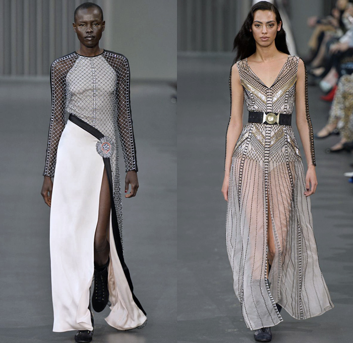 Temperley London 2018-2019 Fall Autumn Winter Womens Runway Catwalk Looks - London Fashion Week Collections UK - Trail Blazers 1940s Forties Aviator Pilot Military Badges Patches Khaki Fatigues Sheer Chiffon Tulle Geometric Ribbon Embroidery Bedazzled Sequins Clouds Stars Stripes Mesh Fishnet Silk Satin Fur Shearling Quilted Waffle Overcoat Kimono Blouse Shirt Turtleneck Sweater Field Flight Jacket Pantsuit Maxi Dress Gown Eveningwear Wide Leg Cutout Shoulders Combat Boots Wide Belt