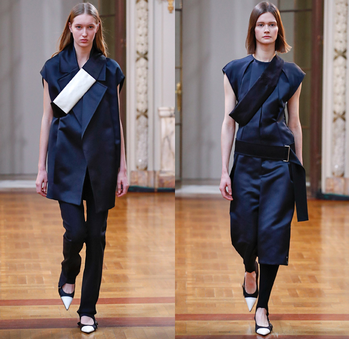 Victoria Beckham 2018-2019 Fall Autumn Winter Womens Runway Catwalk Looks - New York Fashion Week NYFW - Outerwear Overcoat Wool Hoodie Sweatshirt Leather Long Sleeve Blouse Shirt Vest Waistcoat Cargo Pockets Wide Band Belts Curved Hem Drawstring Tie Up Knot Accordion Pleats Jungle Leopard Abstract Animal Print Silk Satin Asymmetrical Hem Drapery Leggings Tights Skirt Maxi Dress Cropped Pants Duvet Shopper Powder Box Long Strap Square Toe Alligator Crocodile Leather Tote Handbag Shoes Footwear