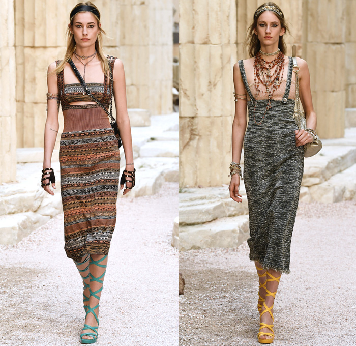 Chanel 2018 Resort Cruise Pre-Spring Womens Runway Catwalk Looks Collection Karl Lagerfeld - Ancient Greece Mediterranean Burlap Gold Coins Buttons Laurel Leaves Column Toga Dress Intarsia Stripes Knit Weave Tweed Mesh Ribbed Crochet Basketweave Sweater Jumper Fringes Sheer Chiffon Ornaments Decorative Art Bandeau Crop Top Pinafore Dress Outerwear Jacketdress Miniskirt Vest Tiered Pussycat Bow Ribbon Lace Embroidery Flowers Floral Bedazzled Jewels Jewels Sequins Pearls Wrap Tie Up Silk Satin Shorts Bodyplate Armor Strapless Accordion Pleats Halterneck Robe Goddess Gown Eveningwear Wind Swirls One Shoulder Gladiator Sandals Straps Bangles Choker Sunglasses Corset Drapery Handbag Purse Clutch Faded Denim Jeans 