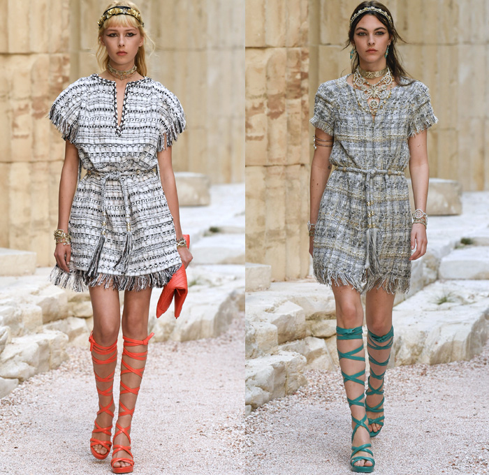 Chanel 2018 Resort Cruise Pre-Spring Womens Runway Catwalk Looks Collection Karl Lagerfeld - Ancient Greece Mediterranean Burlap Gold Coins Buttons Laurel Leaves Column Toga Dress Intarsia Stripes Knit Weave Tweed Mesh Ribbed Crochet Basketweave Sweater Jumper Fringes Sheer Chiffon Ornaments Decorative Art Bandeau Crop Top Pinafore Dress Outerwear Jacketdress Miniskirt Vest Tiered Pussycat Bow Ribbon Lace Embroidery Flowers Floral Bedazzled Jewels Jewels Sequins Pearls Wrap Tie Up Silk Satin Shorts Bodyplate Armor Strapless Accordion Pleats Halterneck Robe Goddess Gown Eveningwear Wind Swirls One Shoulder Gladiator Sandals Straps Bangles Choker Sunglasses Corset Drapery Handbag Purse Clutch Faded Denim Jeans 