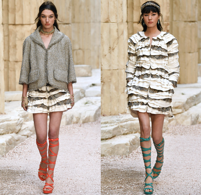 Chanel 2018 Resort Cruise Pre-Spring Womens Runway Catwalk Looks Collection Karl Lagerfeld - Ancient Greece Mediterranean Burlap Gold Coins Buttons Laurel Leaves Column Toga Dress Intarsia Stripes Knit Weave Tweed Mesh Ribbed Crochet Basketweave Sweater Jumper Fringes Sheer Chiffon Ornaments Decorative Art Bandeau Crop Top Pinafore Dress Outerwear Jacketdress Miniskirt Vest Tiered Pussycat Bow Ribbon Lace Embroidery Flowers Floral Bedazzled Jewels Jewels Sequins Pearls Wrap Tie Up Silk Satin Shorts Bodyplate Armor Strapless Accordion Pleats Halterneck Robe Goddess Gown Eveningwear Wind Swirls One Shoulder Gladiator Sandals Straps Bangles Choker Sunglasses Corset Drapery Handbag Purse Clutch Faded Denim Jeans 