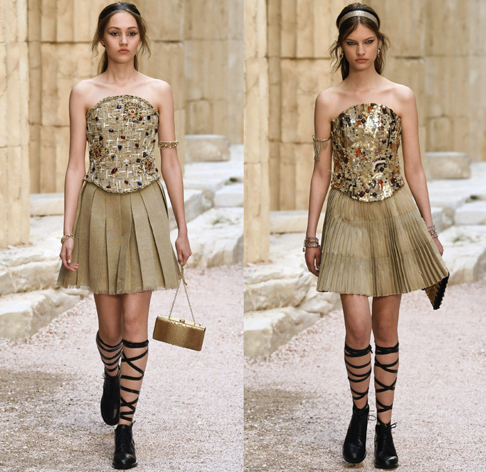 Chanel 2018 Resort Cruise Pre-Spring Womens Runway Catwalk Looks Collection Karl Lagerfeld - Ancient Greece Mediterranean Burlap Gold Coins Buttons Laurel Leaves Column Toga Dress Intarsia Stripes Knit Weave Tweed Mesh Ribbed Crochet Basketweave Sweater Jumper Fringes Sheer Chiffon Ornaments Decorative Art Bandeau Crop Top Pinafore Dress Outerwear Jacketdress Miniskirt Vest Tiered Pussycat Bow Ribbon Lace Embroidery Flowers Floral Bedazzled Jewels Jewels Sequins Pearls Wrap Tie Up Silk Satin Shorts Bodyplate Armor Strapless Accordion Pleats Halterneck Robe Goddess Gown Eveningwear Wind Swirls One Shoulder Gladiator Sandals Straps Bangles Choker Sunglasses Corset Drapery Handbag Purse Clutch Faded Denim Jeans 