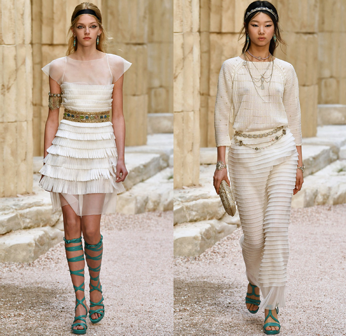 Chanel 2018 Resort Cruise Pre-Spring Womens Runway Catwalk Looks Collection Karl Lagerfeld - Ancient Greece Mediterranean Burlap Gold Coins Buttons Laurel Leaves Column Toga Dress Intarsia Stripes Knit Weave Tweed Mesh Ribbed Crochet Basketweave Sweater Jumper Fringes Sheer Chiffon Ornaments Decorative Art Bandeau Crop Top Pinafore Dress Outerwear Jacketdress Miniskirt Vest Tiered Pussycat Bow Ribbon Lace Embroidery Flowers Floral Bedazzled Jewels Jewels Sequins Pearls Wrap Tie Up Silk Satin Shorts Bodyplate Armor Strapless Accordion Pleats Halterneck Robe Goddess Gown Eveningwear Wind Swirls One Shoulder Gladiator Sandals Straps Bangles Choker Sunglasses Corset Drapery Handbag Purse Clutch Faded Denim Jeans 