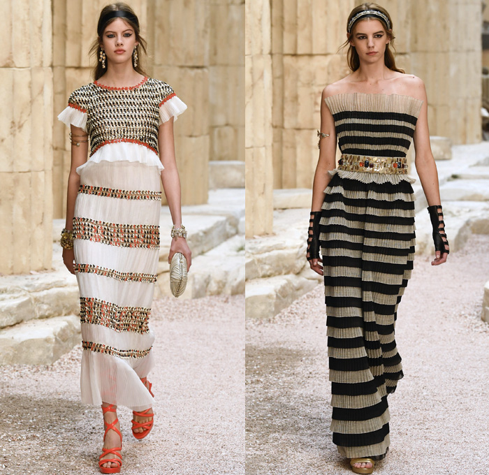 Chanel 2018 Resort Cruise Pre-Spring Womens Runway Catwalk Looks Collection Karl Lagerfeld - Ancient Greece Mediterranean Burlap Gold Coins Buttons Laurel Leaves Column Toga Dress Intarsia Stripes Knit Weave Tweed Mesh Ribbed Crochet Basketweave Sweater Jumper Fringes Sheer Chiffon Ornaments Decorative Art Bandeau Crop Top Pinafore Dress Outerwear Jacketdress Miniskirt Vest Tiered Pussycat Bow Ribbon Lace Embroidery Flowers Floral Bedazzled Jewels Jewels Sequins Pearls Wrap Tie Up Silk Satin Shorts Bodyplate Armor Strapless Accordion Pleats Halterneck Robe Goddess Gown Eveningwear Wind Swirls One Shoulder Gladiator Sandals Straps Bangles Choker Sunglasses Corset Drapery Handbag Purse Clutch Faded Denim Jeans 