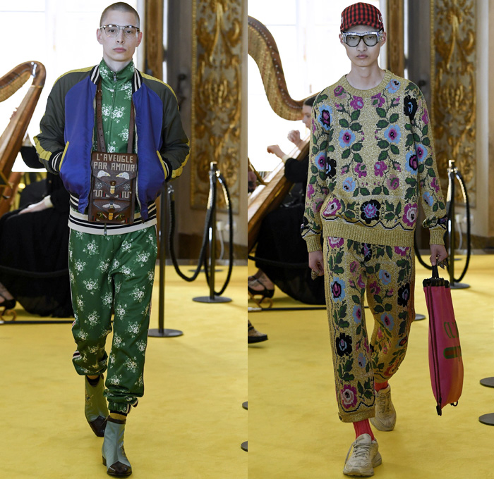 Gucci 2018 Resort Cruise Pre-Spring Mens Runway Catwalk Looks Collection - Palatine Gallery Palazzo Pitti Florence Italy - Renaissance Outerwear Overcoat Parka Quilted Waffle Puffer Down Bomber Field Jacket Suit Blazer Pants Trousers Formal Attire Sweater Jumper Shaggy Plush Fur Shearling Outdoorsman Flowers Floral Botanical Leaves Foliage Print Motif Velour Velvet Plaid Tartan Check Illustration Insects Butterfly Grasshopper Snake Teddy Bear Tiger Mesh Denim Dad Jeans Relaxed Tapered Acid Wash Bleached Boots Headband Loafers Bracelet Socks Doctor's Bag Lanyard Hat