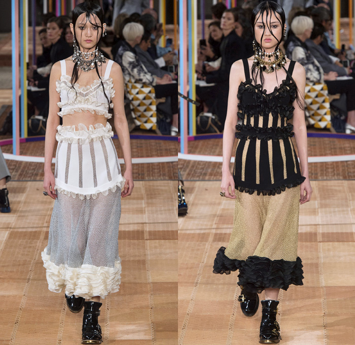 Alexander McQueen 2018 Spring Summer Womens Runway Catwalk Looks - Mode à Paris Fashion Week France - Denim Jeans Detachable Panels Buttons Skirt Trench Coat Motorcycle Biker Leather Jacket Zippers Crop Top Midriff Quilted Pantsuit Leg O'Mutton Sleeves Capelet One Shoulder Knit Sweater Basketweave 3D Flowers Floral Sheer Chiffon Organza Tulle Mesh Grid Plaid Bedazzled Tutu Maxi Dress Dress Gown Eveningwear Ruffles Tiered Noodle Strap Lace Fringes Feathers Gemstones Studs Boots Handbag