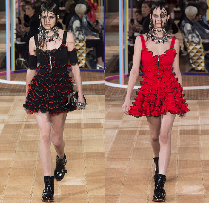 Alexander McQueen 2018 Spring Summer Womens Runway Catwalk Looks - Mode à Paris Fashion Week France - Denim Jeans Detachable Panels Buttons Skirt Trench Coat Motorcycle Biker Leather Jacket Zippers Crop Top Midriff Quilted Pantsuit Leg O'Mutton Sleeves Capelet One Shoulder Knit Sweater Basketweave 3D Flowers Floral Sheer Chiffon Organza Tulle Mesh Grid Plaid Bedazzled Tutu Maxi Dress Dress Gown Eveningwear Ruffles Tiered Noodle Strap Lace Fringes Feathers Gemstones Studs Boots Handbag