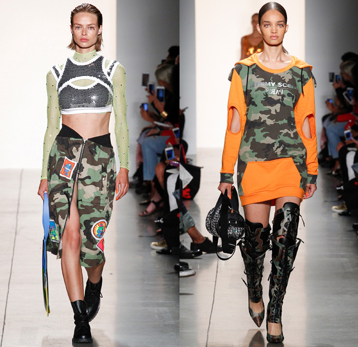 Jeremy Scott 2018 Spring Summer Womens Runway Catwalk Looks - New York Fashion Week NYFW - Paranoia Alien Rings Cartoons Denim Jeans Destroyed Holes Motorcycle Leather Biker Jacket Lace Up Armor Shirtdress Sweaterdress Neon Mesh Fishnet Chain Crop Top Midriff Camouflage Sweatshirt Gemstones Bedazzled Jewels Sequins Metallic Sheer Tulle Cones Ruffles Straps Knot Waist One Shoulder Bodycon Dress Hotpants Gladiator Boots Knee Pads Patches Tights Snakeskin Handbag Tote Barrel Bag Backpack Choker
