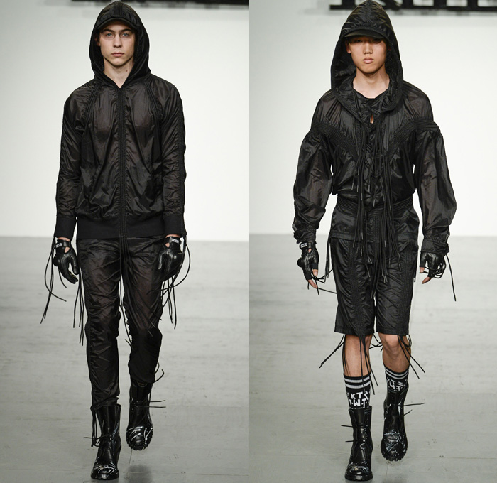 KTZ 2018 Spring Summer Mens Runway Catwalk Looks Marjan Pejoski - London Fashion Week Mens British Fashion Council UK United Kingdom - Stapled Chainmail Chainlink Soda Can Tabs Runes Lettering Plaid Tartan Check Mesh Fishnet Cinch Drawstring Fringes Decorated Appliqués Bedazzled Hardware Metal Clips Denim Jeans Frayed Raw Hem Distressed Vintage Emblems Patches Sleeveless Vest Waistcoat Gilet Motorcycle Biker Rider Moto Vest Hood Sweatshirt Long Sleeve Shirt Outerwear Blazer Bomber Jacket Trench Closures Buttons Quilted Waffle Puffer Parka Coat Poncho Pants Trousers Shorts Cargo Pockets Scarf Paint Splatter Leather Boots Stocking Socks Gloves Cap Streetwear