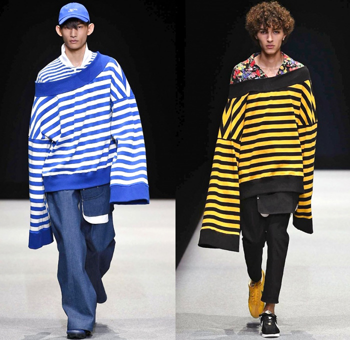Munsoo Kwon Supported By Giorgio Armani 2018 Spring Summer Mens Runway Catwalk Looks - Milano Moda Uomo Collezione Milan Fashion Week Italy - Oversized Frankenstein Football High Shoulders Outerwear Coat Parka Anorak Windbreaker Hood Poncho Cloak Transparent Rainwear Bomber Jacket Nylon Suit Blazer Railroad Stripes Sweater Jumper Flowers Floral Print Drawstring Crop Top Midriff Colorblock Sportswear Athleisure Activewear Tracksuit Jersey Cargo Pockets Denim Jeans Cropped Pants Wide Leg Trousers Camouflage Shorts Mismatch Sneakers Baseball Cap
