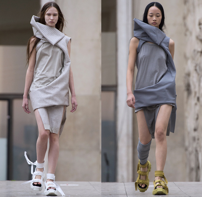 Rick Owens 2018 Spring Summer Womens Runway Catwalk Looks - Mode à Paris Fashion Week Mode Féminin France - Dirt Dimensional Structural Organic Shape Sculptural Futuristic Pillow Wrap Cocoon Stuffed Outerwear Coat Blazerdress Hanging Sleeve Cape Shawl Blanket Holes Wrap Drapery Leather Peel Away Angular Pointed Tie Up Metallic Sheen Strapless Dress Gown Blouse Skirt Pleats Sleeveless One Shoulder Duffeldress Shorts Sneakers Sandals Warmers Asymmetrical Fanny Pack Waist Pouch Belt Bag