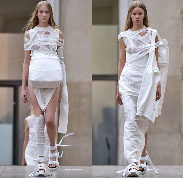 Rick Owens 2018 Spring Summer Womens Runway Catwalk Looks - Mode à Paris Fashion Week Mode Féminin France - Dirt Dimensional Structural Organic Shape Sculptural Futuristic Pillow Wrap Cocoon Stuffed Outerwear Coat Blazerdress Hanging Sleeve Cape Shawl Blanket Holes Wrap Drapery Leather Peel Away Angular Pointed Tie Up Metallic Sheen Strapless Dress Gown Blouse Skirt Pleats Sleeveless One Shoulder Duffeldress Shorts Sneakers Sandals Warmers Asymmetrical Fanny Pack Waist Pouch Belt Bag