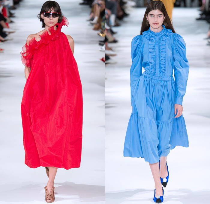 Stella McCartney 2018 Spring Summer Womens Runway Catwalk Looks - Mode à Paris Fashion Week France - Oversized Denim Jeans Cargo Pockets Tapered Colored Dyed Vest Onesie Jumpsuit Coveralls Boiler Suit Electric Fan Satin Geometric Fins Ruffles Pleather PVC Vinyl Sheer Chiffon Organza Tulle Leopard Fringes Microphone Fan Pop Art Motif Blouse Leg O'Mutton Sleeves One Shoulder Strapless Tie Up Waist Knot Shirtdress Cutout Waist Culottes Maxi Dress Sunglasses Boots Sandals Clutch Purse Handbag 