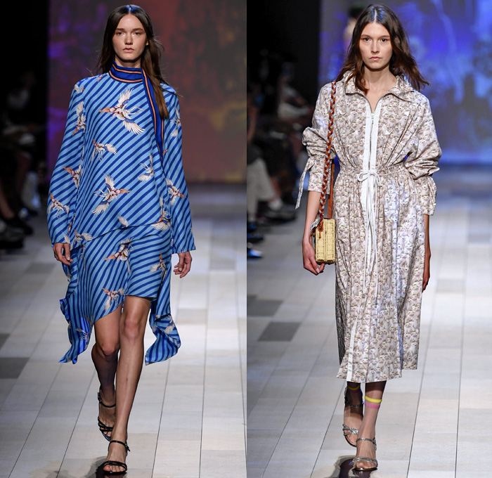 Vivienne Tam 2018 Spring Summer Womens Runway Catwalk Looks - New York Fashion Week NYFW - Wuba Monster Hunt Insects Animals Swans Rocks Trench Coat Denim Jeans Frayed Graffiti Cutout Shoulders Cargo Pockets Patchwork Fanny Pack Waist Pouch Handkerchief Hem Sheer Chiffon Tulle Bedazzled Grosgrain Strap Belt Stripes Rope Waist Lace Tribal Shirtdress Goddess Georgette Gown Tiered Dovetail Mullet Skirt Blouse Peasant Dress Strapless Braid Bracelets Scarf Tote Handbag Bamboo Basketweave