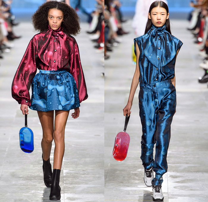 Christopher Kane 2019-2020 Fall Autumn Winter Womens Runway Catwalk Looks - London Fashion Week Collections UK - Liquid Ladies Looner Rubberist Aqua Gel Crystals Bedazzled Gems Satin Tiered Peplum Ruffles Noodle Strap Strapless Babydoll Dress Gown Shirtdress Blouse Wool Coat Bubbles Balloons Fringes Knit Cardigan One Shoulder Draped Cutout Waist Scarf Sheer Tulle Tearaway Snap Buttons Quilted Puffer Parka Cape Pellegrina Turtleneck Lace Embroidery Needlework Gloves Trainers Boots