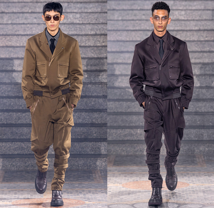 Ermenegildo Zegna XXX 2019-2020 Fall Autumn Winter Mens Runway Looks - Milano Moda Uomo Milan Fashion Week Italy - Couture Streetwear Knit Sweater Cardigan Walking Men Geometric Graphic Fur Plush Sweatshirt Outerwear Coat Quilted Puffer Down Parka Jacket Cargo Utility Pockets Corduroy Plaid Check Wide Band Single Button Boxy Blazer Suit Wool Necktie Slim Tapered Pants Leg Straps Aviator Ear Flap Shooting Hat Gloves Sunglasses Duffel Pyramid Bag Cesare Sneakers Boots