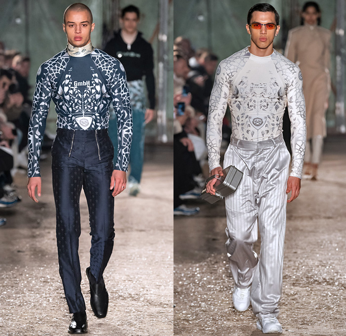 GmbH 2019-2020 Fall Autumn Winter Mens Runway Show Looks - Mode à Paris Fashion Week Mode Masculine France - Rare Earth Botanical Vines Leaves Foliage Print Turtleneck Sweater Denim Jeans Paint Smudges Sweatshirt Cargo Pockets Quilted Puffer Trench Coat Parka Holster Shoulder Blazer Bomber Jacket Motorcycle Biker Panels Double Zipper Pants Tin Can Box Trainers