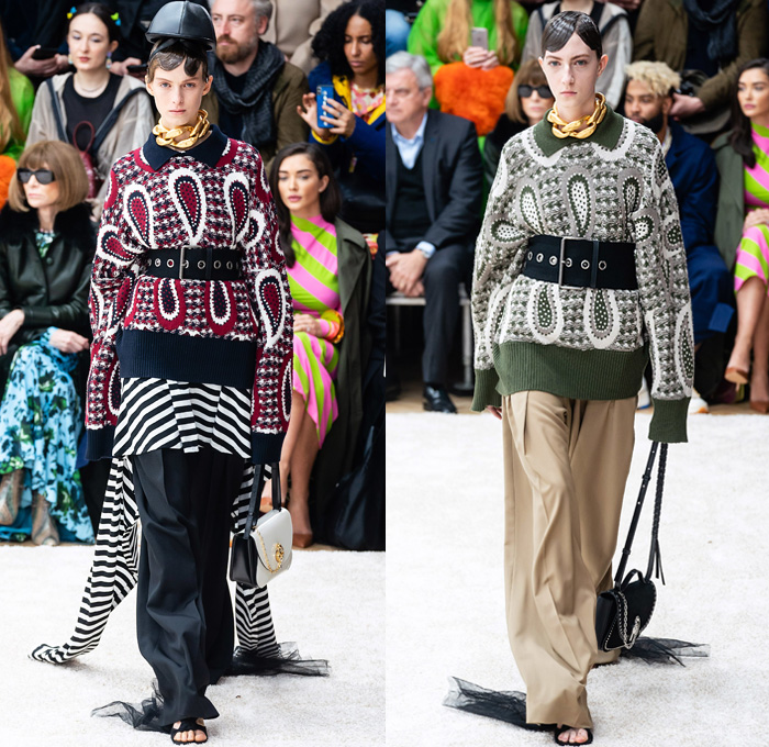 JW Anderson 2019-2020 Fall Autumn Winter Womens Runway Catwalk Looks - London Fashion Week Collections UK - Action Figure Doll Hair Oversized Wide Neckline Slouchy Sleeves Trench Coat Check Plaid Stripes Dots Sheer Tulle Cape Poncho Tie Up Waist Patchwork Blazer Pantsuit Lace Needlework Embroidery Houndstooth Tweed Paisley Knit Turtleneck Sweaterdress Hanging Sleeve Wide Leg Pants Belt Ruffles Bedazzled Silk Satin Dress Draped Fringes Gown Chain Equestrian Hat Bag Boots