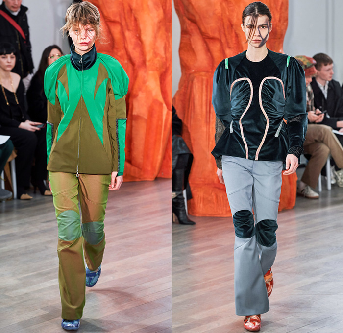 Kiko Kostadinov 2019-2020 Fall Autumn Winter Womens Runway Catwalk Looks - London Fashion Week Collections UK - Troll Doll Hair Knitwear Fringes Bib Turtleneck Gauntlet Arm Sleeve Poufy Shoulders Holes Dress Coat Velvet Knee Panels Stripes Skirt Grapes Scarf Cinch Draped Corduroy Angular Hem Nylon Asics Camper Drawstring Boots